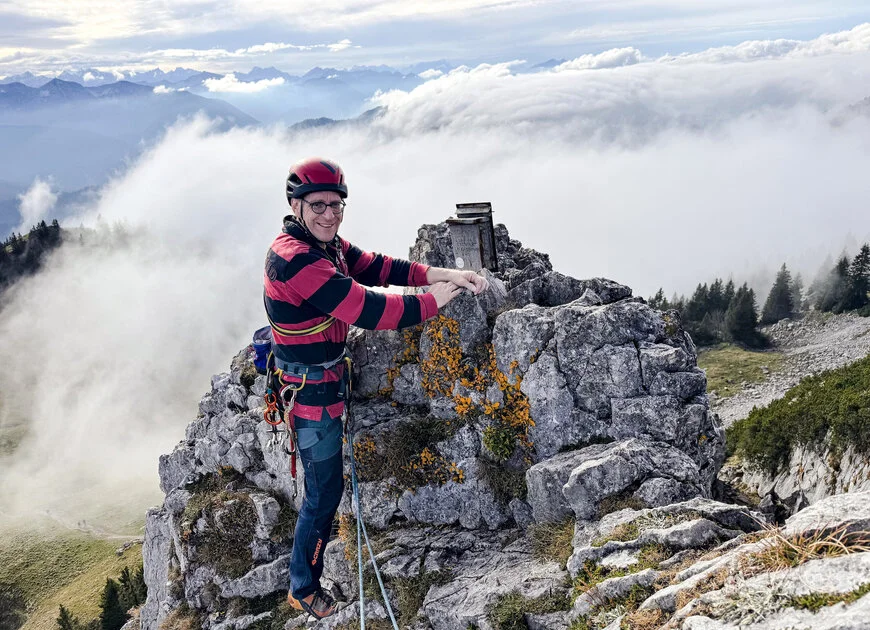 lächelnder Mann auf einem Gipfel in den Bergen | © DAV Heilbronn DAV Heilbronn Team | © DAV Heilbronn